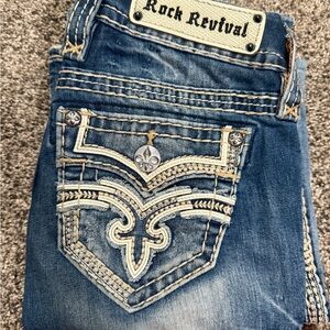 Rock Revival Distressed Blue Jeans with Embroidered Pockets